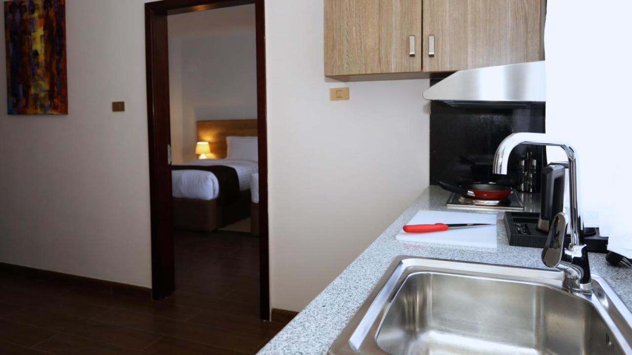 Black Horse Hotel Apartment Addis Ababa Bagian luar foto