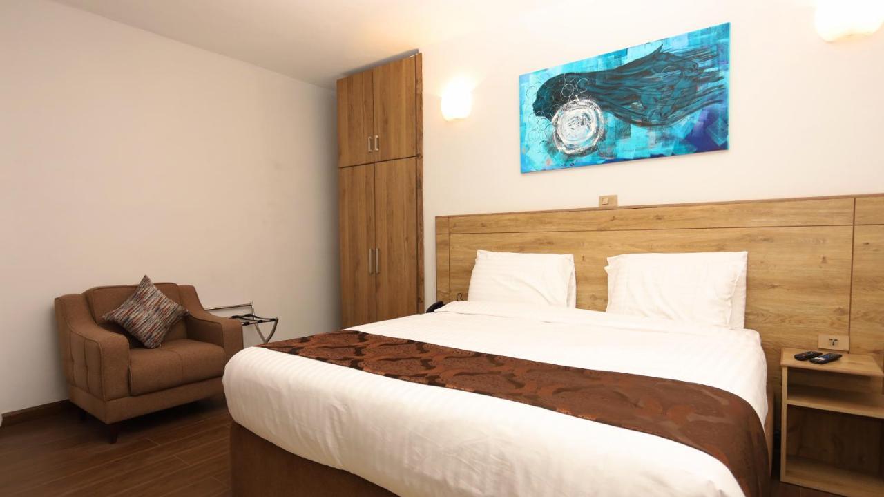 Black Horse Hotel Apartment Addis Ababa Bagian luar foto